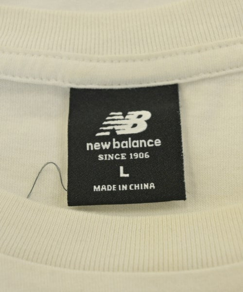 New Balance เสื้อยืด/เสื้อท็อปส์