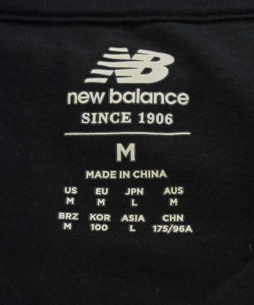 New Balance เสื้อยืด/เสื้อท็อปส์