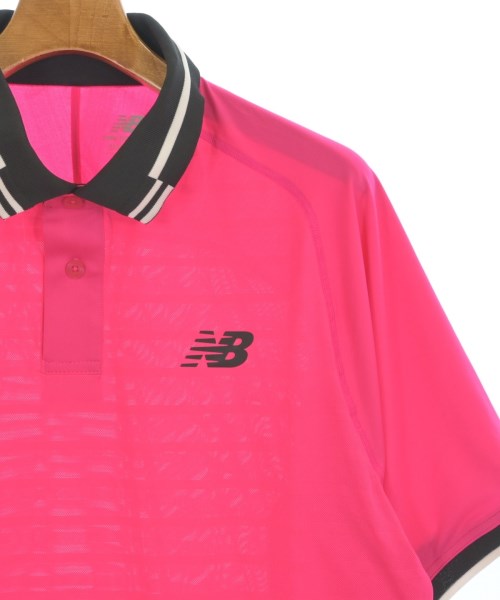 New Balance เสื้อยืด/เสื้อท็อปส์