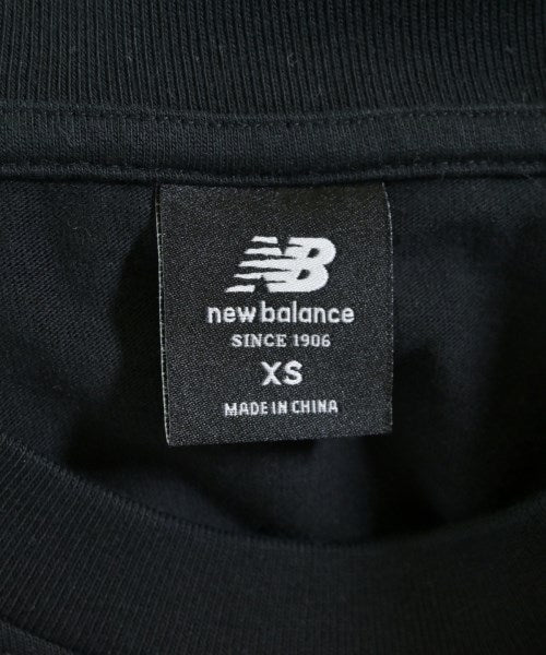 New Balance เสื้อยืด/เสื้อท็อปส์