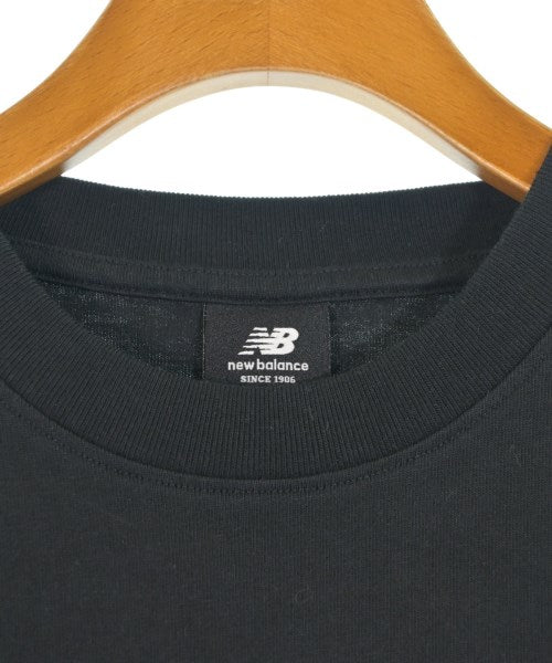 New Balance เสื้อยืด/เสื้อท็อปส์