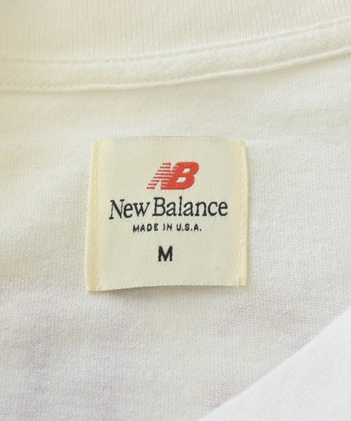 New Balance เสื้อยืด/เสื้อท็อปส์