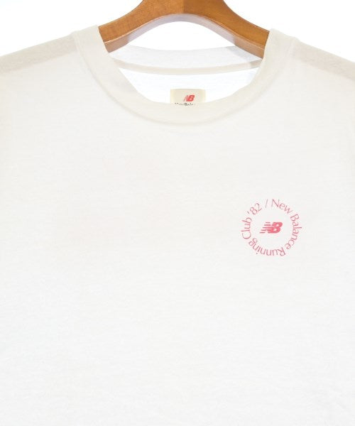 New Balance เสื้อยืด/เสื้อท็อปส์