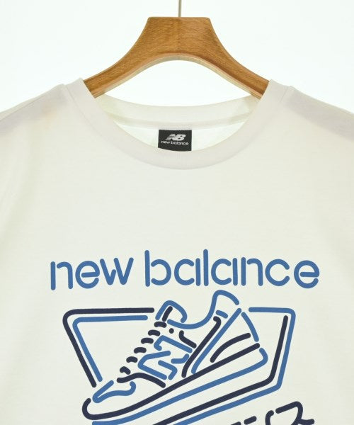 New Balance เสื้อยืด/เสื้อท็อปส์