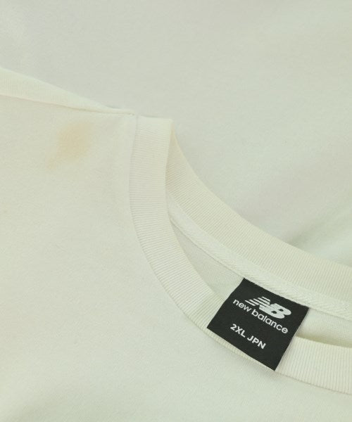 New Balance เสื้อยืด/เสื้อท็อปส์