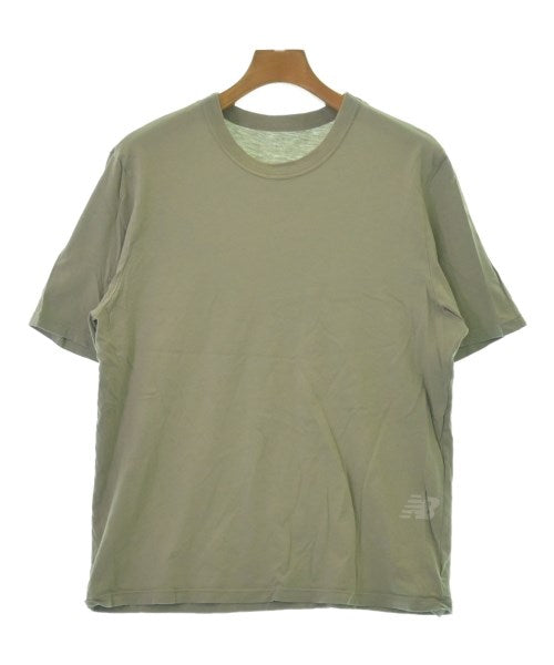 New Balance เสื้อยืด/เสื้อท็อปส์