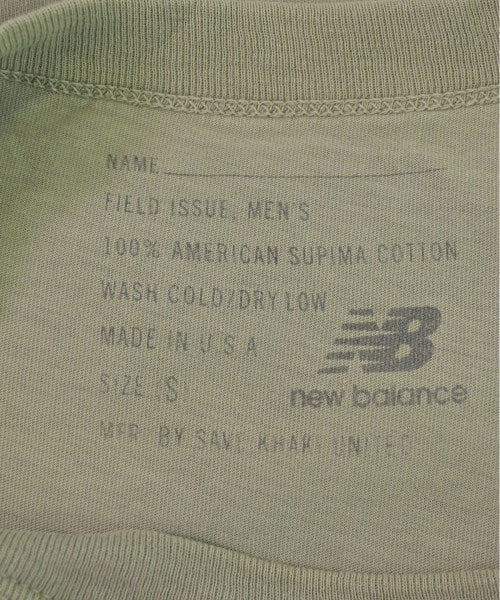 New Balance เสื้อยืด/เสื้อท็อปส์