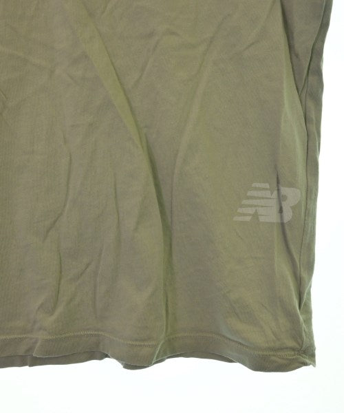New Balance เสื้อยืด/เสื้อท็อปส์