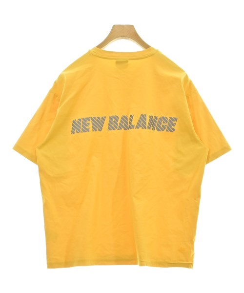 New Balance เสื้อยืด/เสื้อท็อปส์
