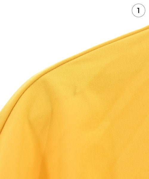 New Balance เสื้อยืด/เสื้อท็อปส์