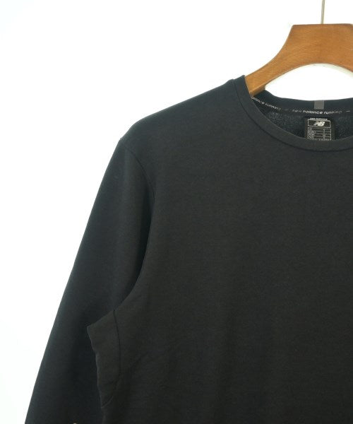 New Balance เสื้อยืด/เสื้อท็อปส์