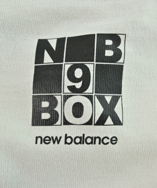 New Balance เสื้อยืด/เสื้อท็อปส์