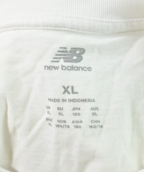 New Balance เสื้อยืด/เสื้อท็อปส์