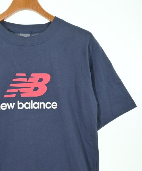 New Balance เสื้อยืด/เสื้อท็อปส์