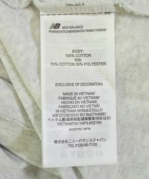 New Balance เสื้อยืด/เสื้อท็อปส์