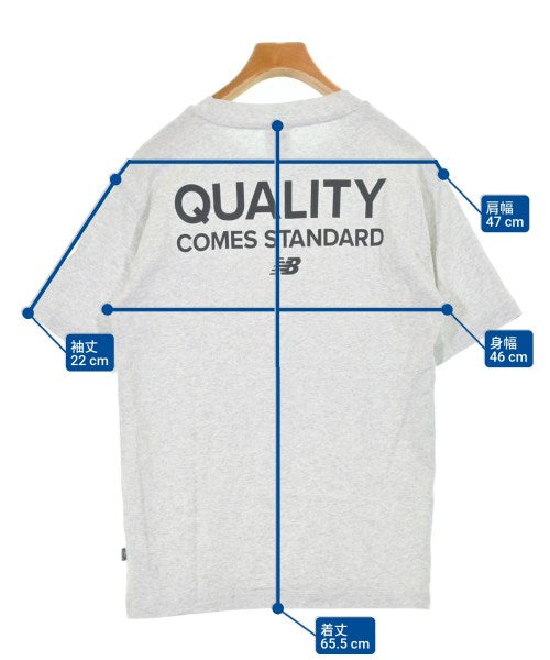 New Balance เสื้อยืด/เสื้อท็อปส์