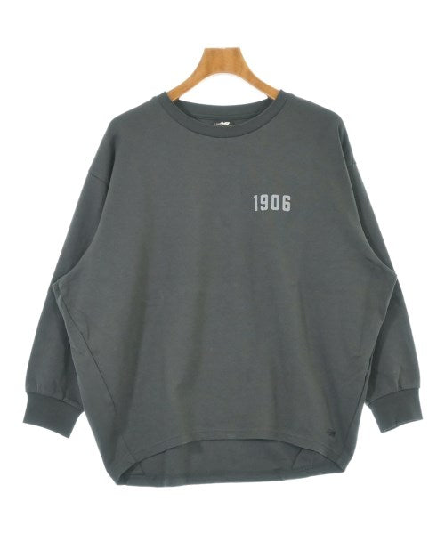 New Balance เสื้อยืด/เสื้อท็อปส์