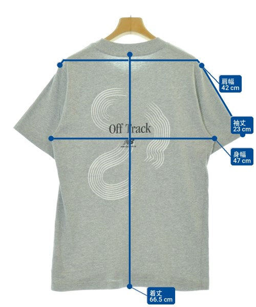 New Balance เสื้อยืด/เสื้อท็อปส์