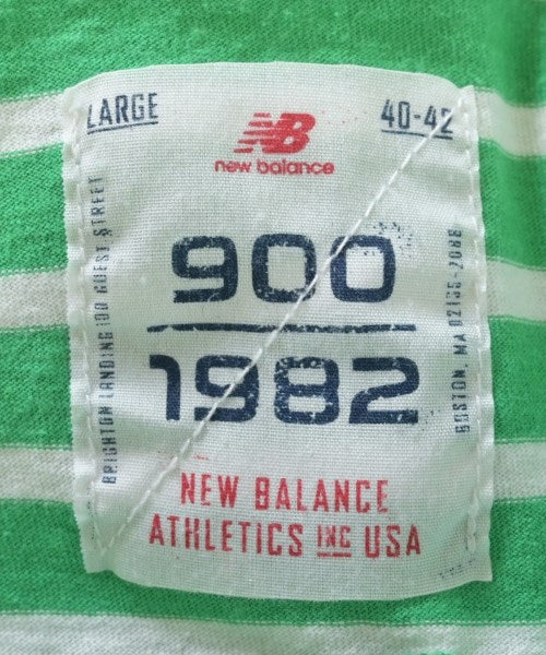 New Balance เสื้อยืด/เสื้อท็อปส์
