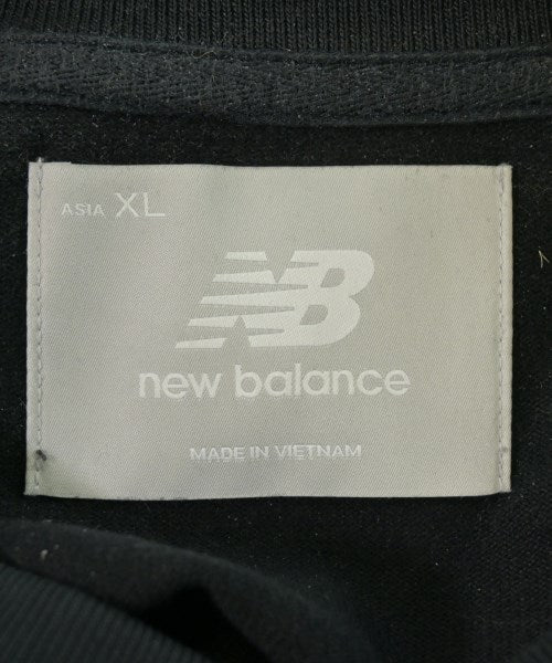 New Balance เสื้อยืด/เสื้อท็อปส์