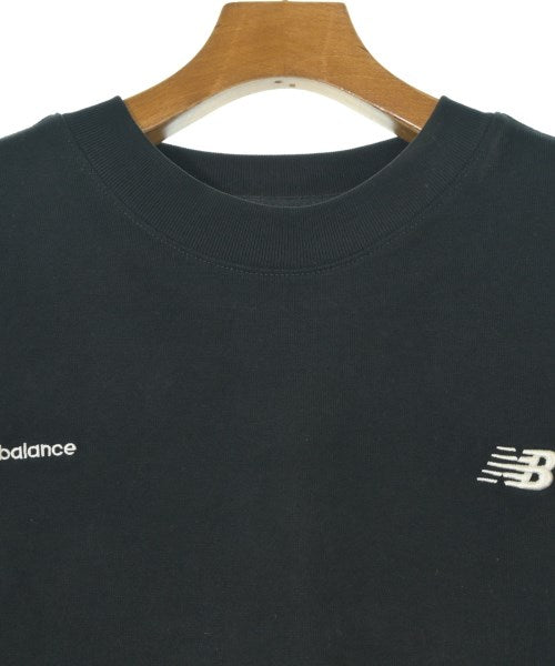 New Balance เสื้อยืด/เสื้อท็อปส์