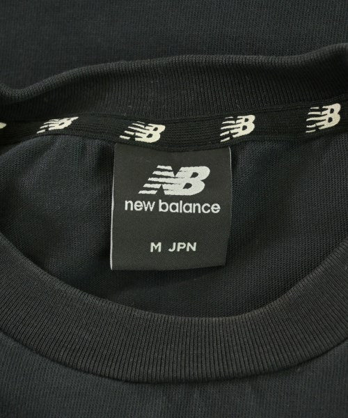 New Balance เสื้อยืด/เสื้อท็อปส์