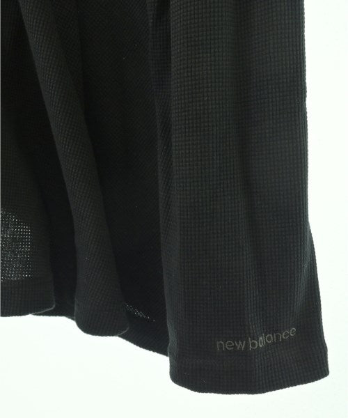 New Balance เสื้อยืด/เสื้อท็อปส์