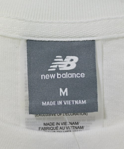 New Balance เสื้อยืด/เสื้อท็อปส์