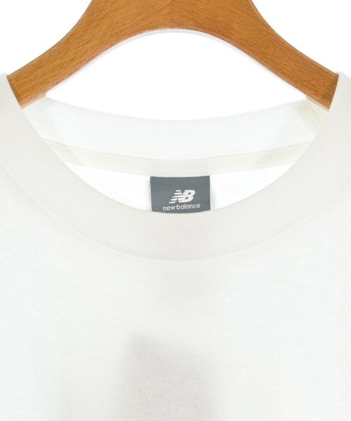 New Balance เสื้อยืด/เสื้อท็อปส์