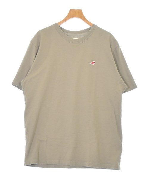 New Balance เสื้อยืด/เสื้อท็อปส์