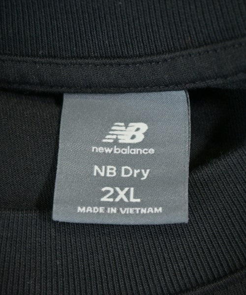 New Balance เสื้อยืด/เสื้อท็อปส์