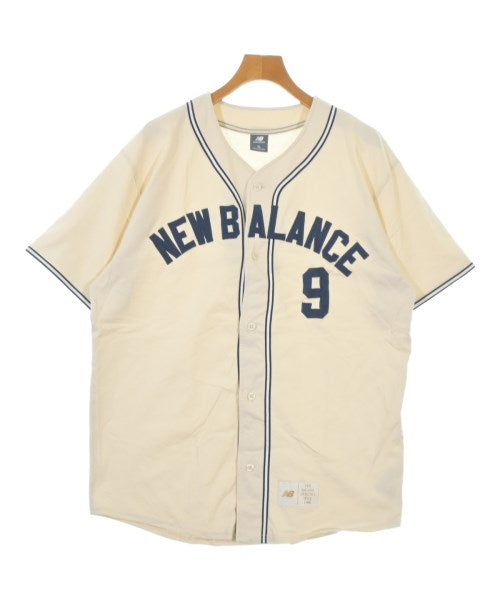 New Balance เสื้อยืด/เสื้อท็อปส์