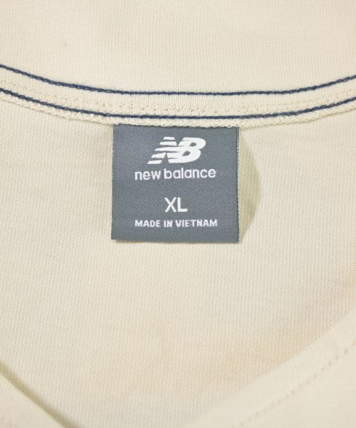 New Balance เสื้อยืด/เสื้อท็อปส์