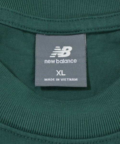 New Balance เสื้อยืด/เสื้อท็อปส์