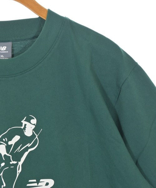 New Balance เสื้อยืด/เสื้อท็อปส์