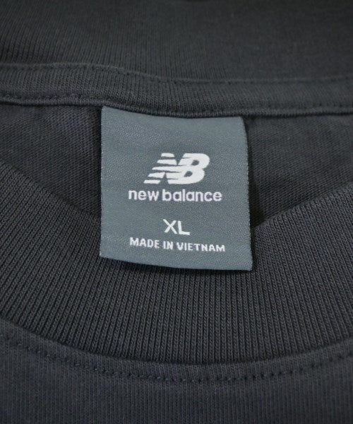 New Balance เสื้อยืด/เสื้อท็อปส์