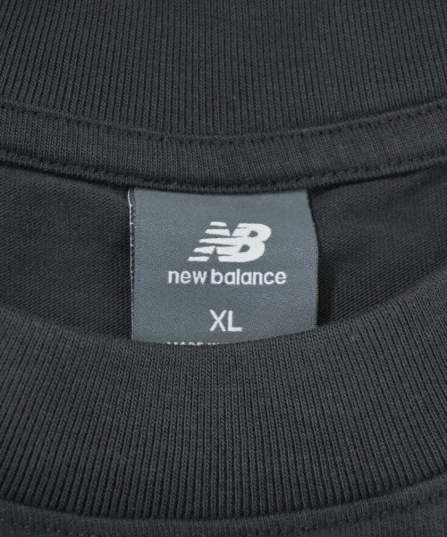 New Balance เสื้อยืด/เสื้อท็อปส์