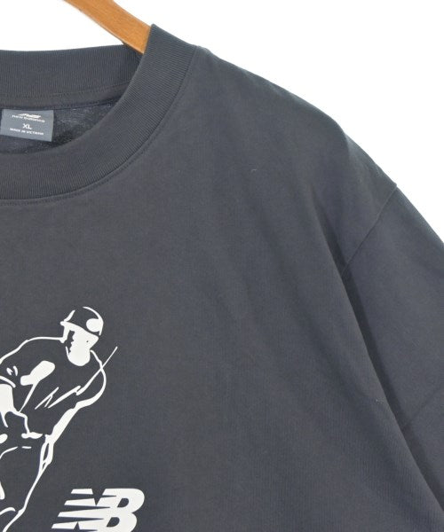 New Balance เสื้อยืด/เสื้อท็อปส์