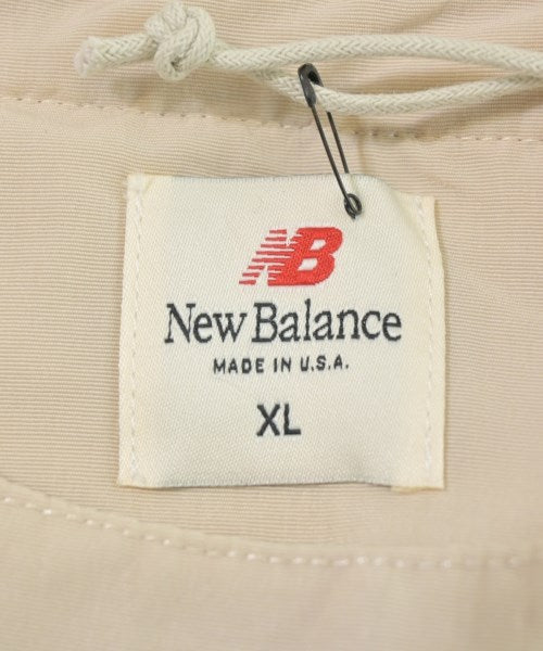 New Balance เสื้อยืด/เสื้อท็อปส์