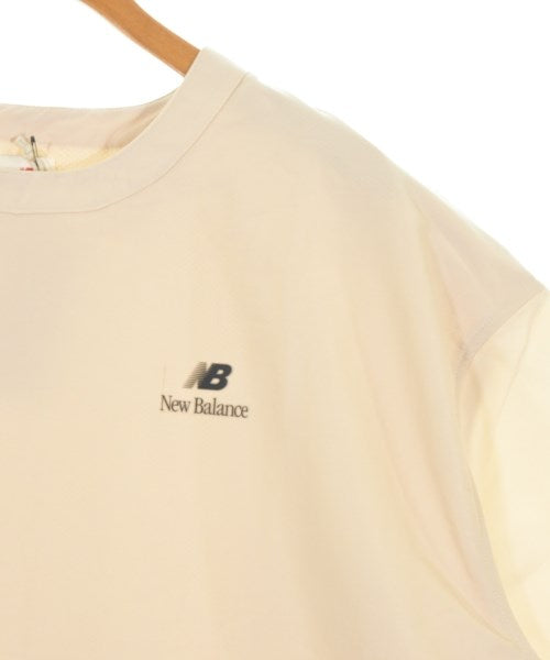 New Balance เสื้อยืด/เสื้อท็อปส์