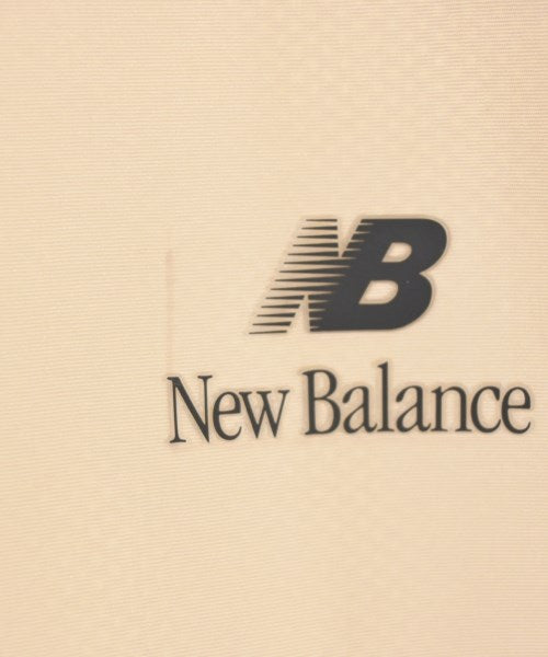 New Balance เสื้อยืด/เสื้อท็อปส์
