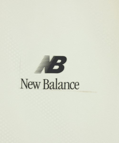 New Balance เสื้อยืด/เสื้อท็อปส์