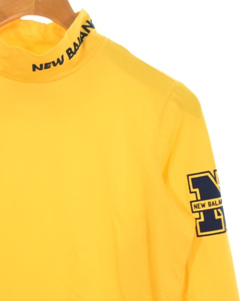 New Balance เสื้อยืด/เสื้อท็อปส์
