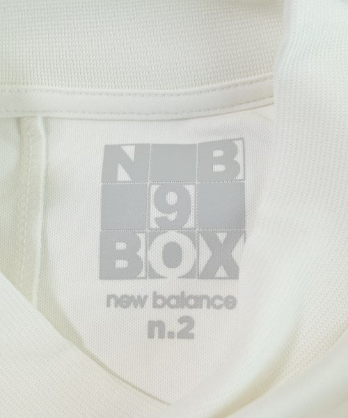 New Balance เสื้อยืด/เสื้อท็อปส์