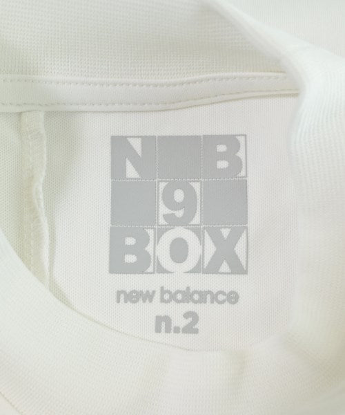 New Balance เสื้อยืด/เสื้อท็อปส์