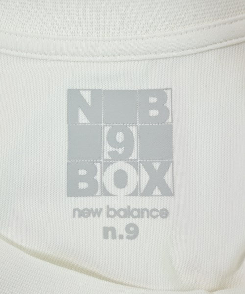 New Balance เสื้อยืด/เสื้อท็อปส์