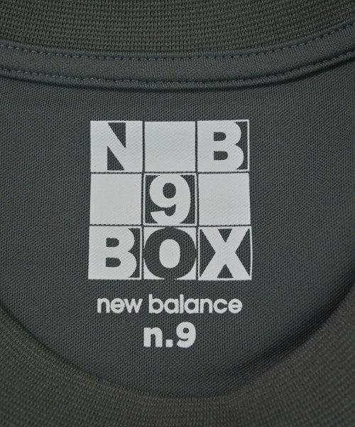 New Balance เสื้อยืด/เสื้อท็อปส์