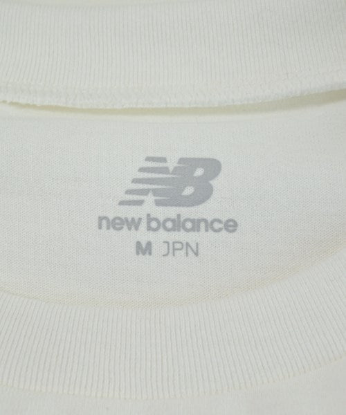 New Balance เสื้อยืด/เสื้อท็อปส์