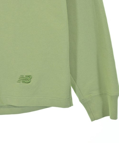 New Balance เสื้อยืด/เสื้อท็อปส์
