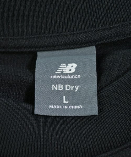 New Balance เสื้อยืด/เสื้อท็อปส์